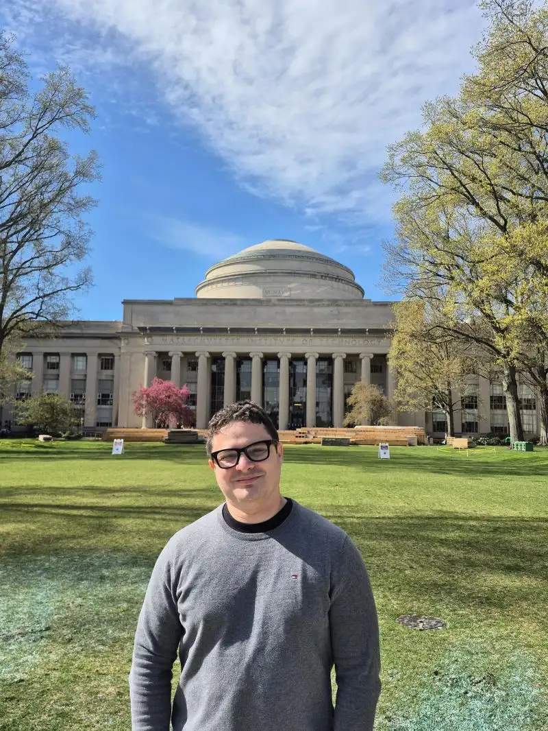 Carlos Rojas at Killian Court in front of the MIT Great Dome